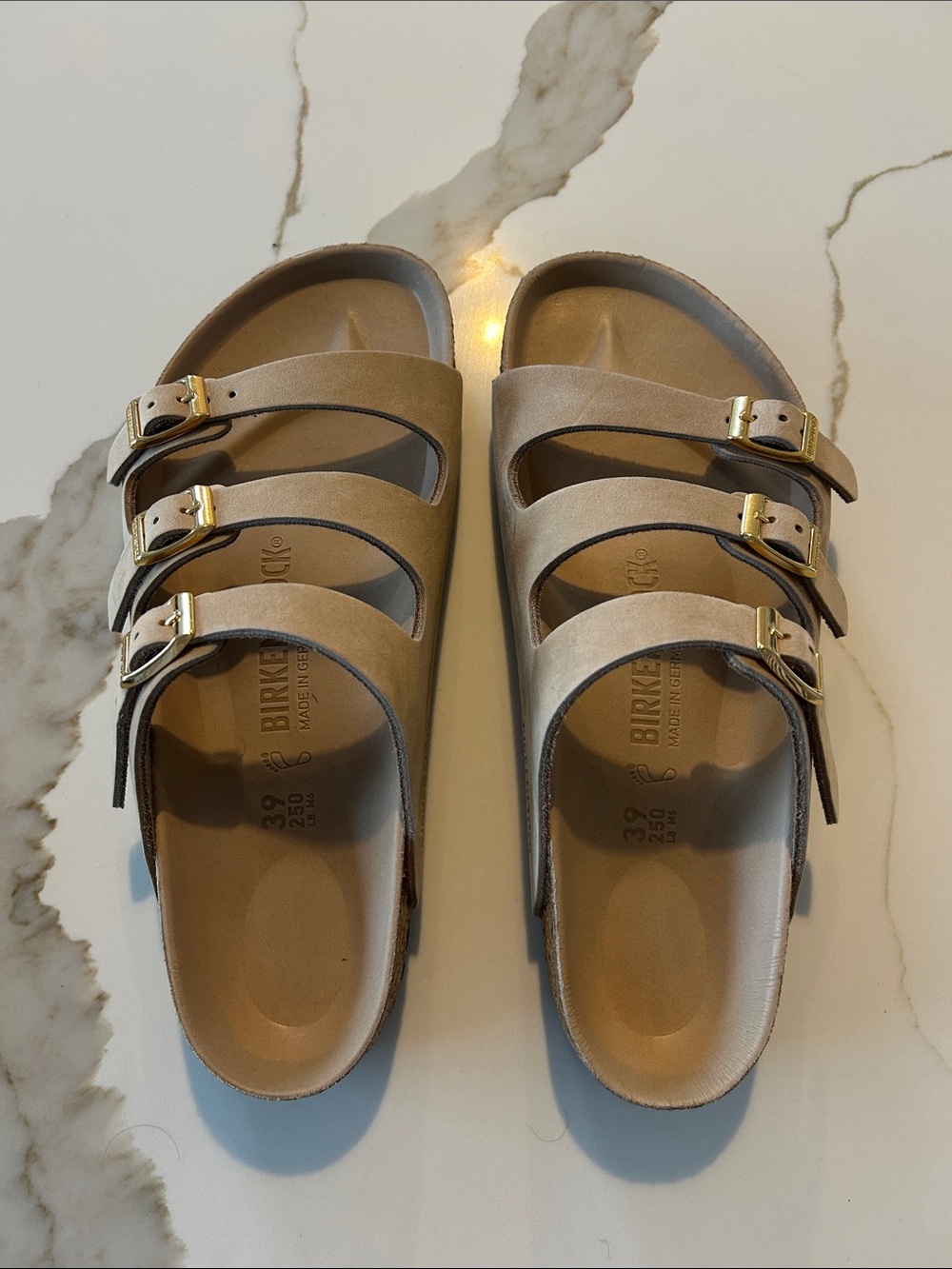 Birkenstock Arizona Triple-Strap Sandals in Taupe with Gold Buckles